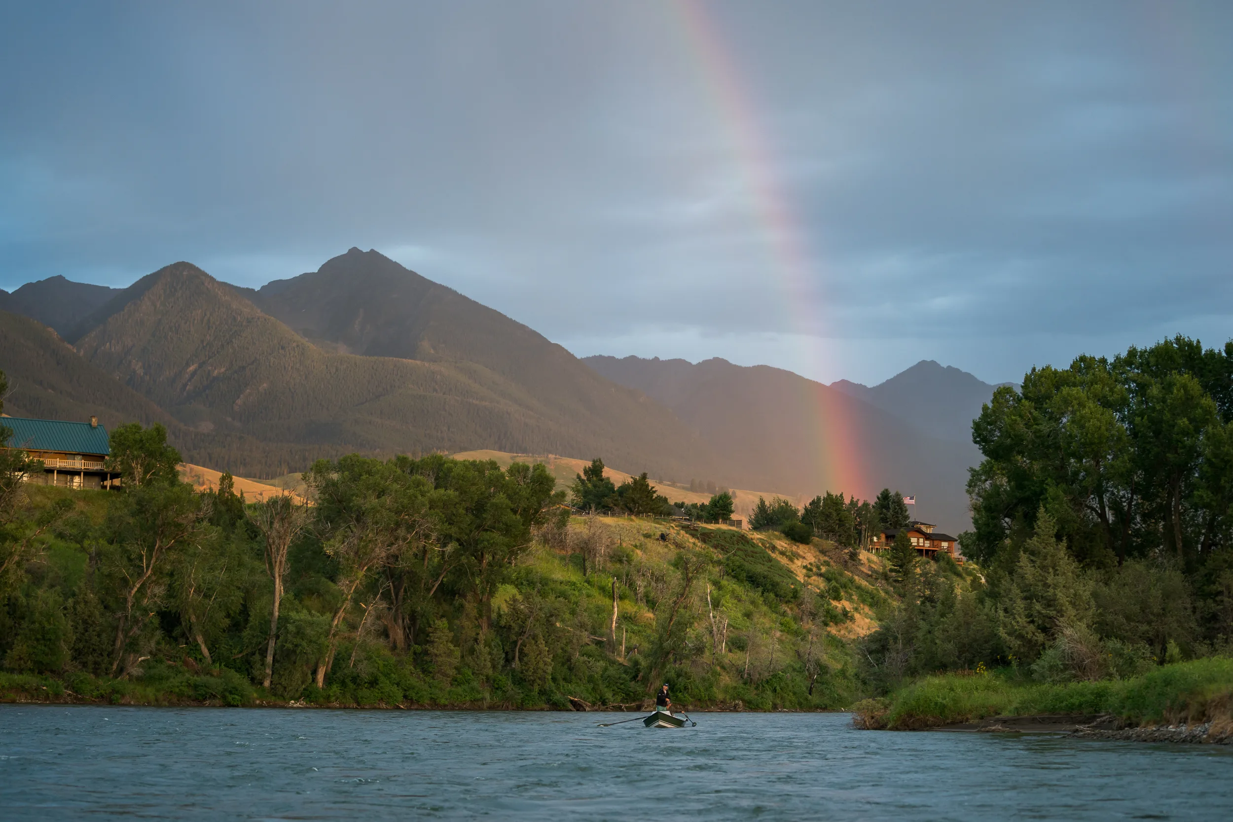 Rainbow over the Yellowstone River with drift boat